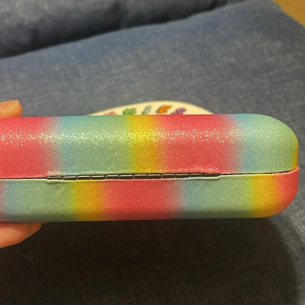 Sunglasses and case. Little girl. Few scratches on the frame. See pictures